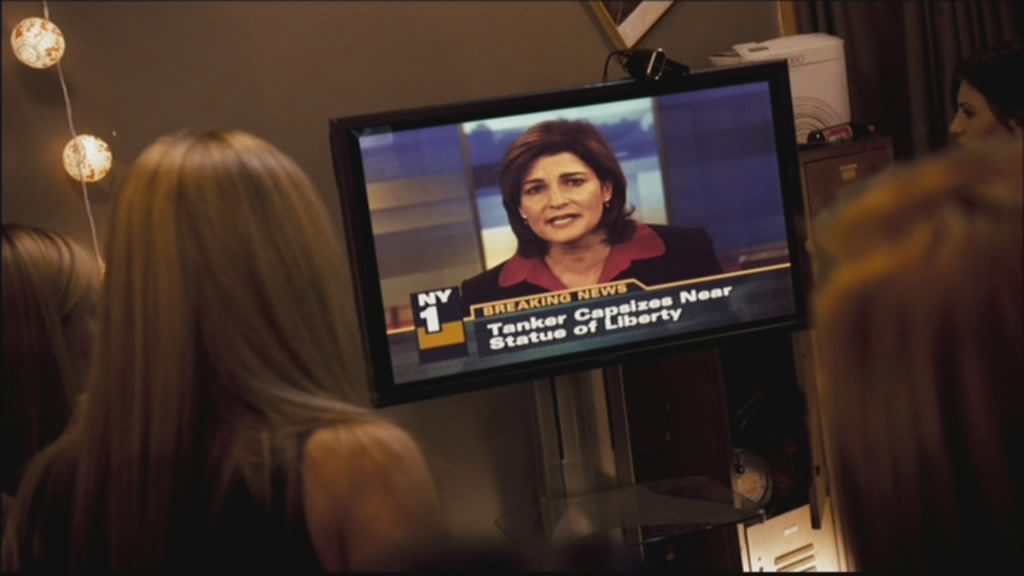 Suddenly, something happens, and the news comes on.
