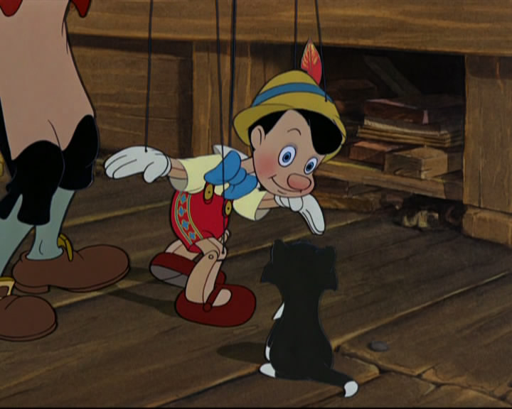 PInocchio dances for Figaro... Thanks to Geppetto.