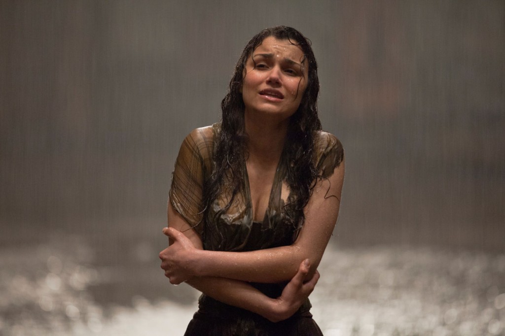 Likes to hug herself in the rain. Sounds like a country song to me.
