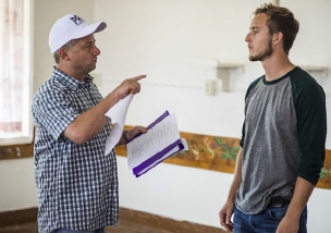 Production still: Listen dude, do as I say or I'll write you out three scenes earlier!