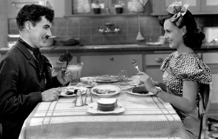 Charlie Chaplin (L) in Modern Times.