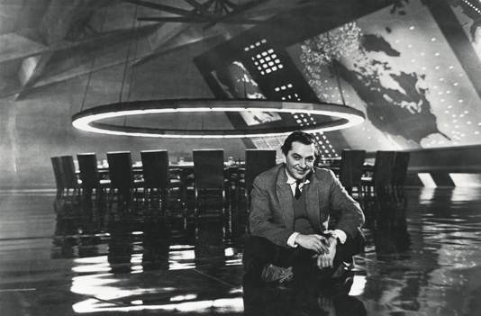 Sir Ken Adam on the set of Stanley Kubrick's Dr Stangelove, the famous War Room designed by him, in 1964