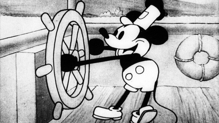 Mickey Mouse in the first animated short with sound - Steamboat Willie....