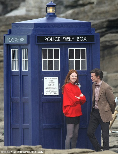 Smith & GIllan stand next to the iconic TARDIS.