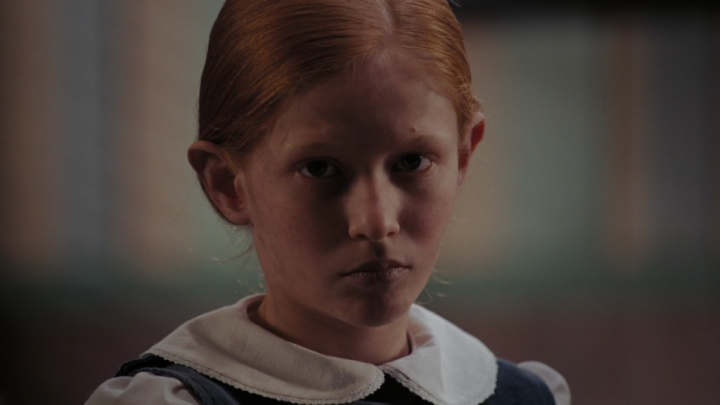 Every scary movie needs a creepy red-headed girl in it.