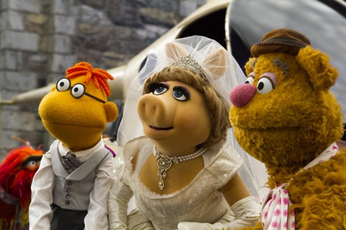 Miss Piggy's dreams almost came true..... marriage to a Bear and a.... Scooter?