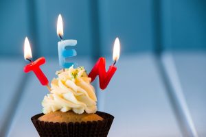 cupcake-with-a-candles-for-10-tenth-birthday