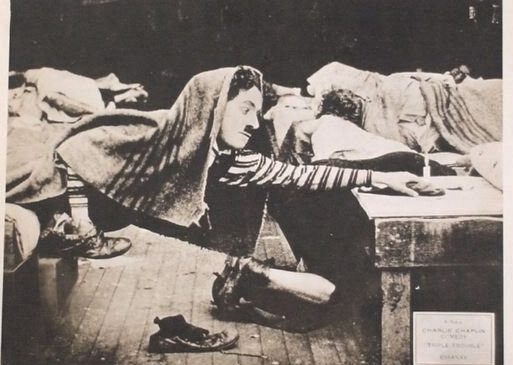 triple-trouble-1918-charlie-chaplin-essanay-lobby_1_ef2d1d509052dc0a4f9e450d380435e1